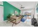 Inviting living room showcasing neutral decor, bright light, and a ceiling fan at 7706 Water Oak Ct, Kissimmee, FL 34747