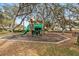 Community playground with slides, ladders and other recreational equipment at 7706 Water Oak Ct, Kissimmee, FL 34747