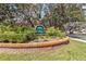 The landscaped entry sign for Ridge Villas at 7706 Water Oak Ct, Kissimmee, FL 34747