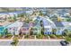 Vibrant, colorful homes with a lake backdrop make up this beautiful community at 8029 Sandy Toes Way, Kissimmee, FL 34747
