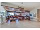 Stylish indoor bar area called Euphoria with comfortable seating and views of the outside at 8029 Sandy Toes Way, Kissimmee, FL 34747