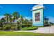 The Margaritaville Resort Orlando sign is surrounded by palm trees and landscaping in a tropical setting at 8029 Sandy Toes Way, Kissimmee, FL 34747