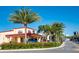 Charming exterior view showcasing professional landscaping and inviting architectural details of Ford's Garage at 8029 Sandy Toes Way, Kissimmee, FL 34747