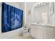 Well-lit bathroom features a tub with themed shower curtain, a vanity and ample counter space at 8103 Coconut Palm Way # 204, Kissimmee, FL 34747