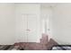 Comfortable bedroom showcasing closet space and access to a connected room at 8103 Coconut Palm Way # 204, Kissimmee, FL 34747