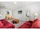 Open concept living room and dining room with natural light at 8103 Coconut Palm Way # 204, Kissimmee, FL 34747