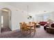 Open concept living room and dining room with natural light at 8103 Coconut Palm Way # 204, Kissimmee, FL 34747