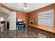 Bedroom featuring hard flooring, ceiling fan, a desk, storage and natural light at 919 Lake Charles Dr, Davenport, FL 33837