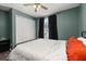 Comfortable bedroom features a large closet and bright window at 919 Lake Charles Dr, Davenport, FL 33837