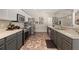 Well-lit kitchen with a stainless steel oven and sink at 919 Lake Charles Dr, Davenport, FL 33837