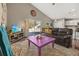 Bright living room featuring a sliding glass door and adjoined to the kitchen at 919 Lake Charles Dr, Davenport, FL 33837