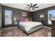 Stylized primary bedroom with ample natural light and modern decor at 919 Lake Charles Dr, Davenport, FL 33837