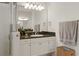 Well-lit bathroom features a vanity, sink, shower, and ample storage space at 993 Everest, Clermont, FL 34711