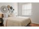 Inviting bedroom featuring a comfortable bed and decorative wall art for a personal touch at 993 Everest, Clermont, FL 34711