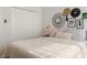 Inviting bedroom with a comfortable bed, decorative wall art, and closet at 993 Everest, Clermont, FL 34711