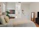 This bedroom features warm neutral colors, decorative artwork, and ample natural light at 993 Everest, Clermont, FL 34711
