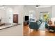 Cozy living room with contemporary furniture, hardwood floors and large sliding doors at 993 Everest, Clermont, FL 34711