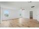 Bright, large bedroom features wood-look floors, and an abundance of natural light at 1143 Seedorf Dr, Winter Haven, FL 33881