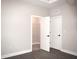 This bright bedroom features stylish flooring, and convenient closet space at 1359 Greenfield Loop, Kissimmee, FL 34747