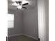 Cozy bedroom with a ceiling fan and a bright window, perfect for relaxation at 1359 Greenfield Loop, Kissimmee, FL 34747