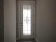 Elegant front door with decorative glasswork at 1359 Greenfield Loop, Kissimmee, FL 34747