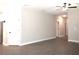Spacious living area with wood-look flooring at 1359 Greenfield Loop, Kissimmee, FL 34747