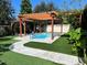 Backyard pool with pergola and gazebo at 14419 Magnolia Ridge Loop, Winter Garden, FL 34787
