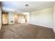 Upstairs loft space featuring neutral walls, carpet, and ample natural light at 15129 Driftwood Bend St, Winter Garden, FL 34787