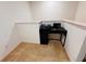 Small carpeted office with a black desk and chair at 1737 Kato Way, Kissimmee, FL 34744