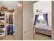 Walk-in closet with custom shelving and storage for all of your organizational needs at 17418 Blazing Star Cir, Clermont, FL 34714
