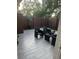 This outdoor patio features tile flooring and modern patio furniture at 1926 Cattleya Dr, Kissimmee, FL 34741