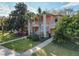 Charming two-story condo showcasing manicured lawns and inviting landscaping at 204 New Providence # 10104, Davenport, FL 33897