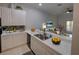 Bright, open kitchen flows seamlessly to living area with stainless steel appliances at 204 New Providence # 10104, Davenport, FL 33897