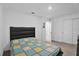 Spacious bedroom with an ensuite bathroom, closet, carpet flooring and neutral colors at 2129 Stillwood Way, St Cloud, FL 34771