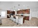 Spacious kitchen featuring an island with bar seating and sleek, modern appliances at 2129 Stillwood Way, St Cloud, FL 34771