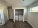 Carpeted laundry room with washer and dryer in an open closet at 220 Brookes Pl, Haines City, FL 33844