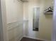 Walk-in closet with wire shelving and mirror at 2494 Sweetwater Club Cir # 55, Kissimmee, FL 34746