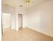 Bedroom with a fan, tiled flooring, and sliding closet doors at 296 Sand Ridge Dr, Davenport, FL 33896