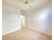 Bedroom featuring tile floors, ceiling fan, and a closet with sliding doors at 296 Sand Ridge Dr, Davenport, FL 33896