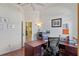 Spacious home office with laminate floors and a view to the rest of the house at 311 N Hampton Dr, Davenport, FL 33897