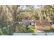 Aerial view of home showcasing the backyard, shed, and surroundings at 3165 Maple Run, Kissimmee, FL 34744