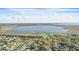 Beautiful aerial view of the neighborhood, lake, and natural landscape at 3165 Maple Run, Kissimmee, FL 34744