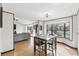 Dining area features a large window with natural light, and flows into living room at 3165 Maple Run, Kissimmee, FL 34744