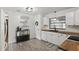 Bright kitchen featuring modern appliances and butcher block countertops at 3165 Maple Run, Kissimmee, FL 34744