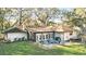 Outdoor patio with fire pit, ideal for entertaining and relaxation at 3165 Maple Run, Kissimmee, FL 34744