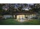 Outdoor patio with fire pit, ideal for entertaining and relaxation at 3165 Maple Run, Kissimmee, FL 34744