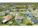 Aerial view of residential area with well-maintained homes and green spaces at 3303 Ann Arbor Ct, St Cloud, FL 34772