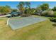 Aerial view of the community basketball court, playground, and picnic area at 3303 Ann Arbor Ct, St Cloud, FL 34772