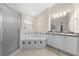 Bathroom featuring a shower, a tub, dual sinks and tile flooring at 3303 Ann Arbor Ct, St Cloud, FL 34772