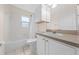 Bathroom features a shower and tub combination and white vanity at 3303 Ann Arbor Ct, St Cloud, FL 34772